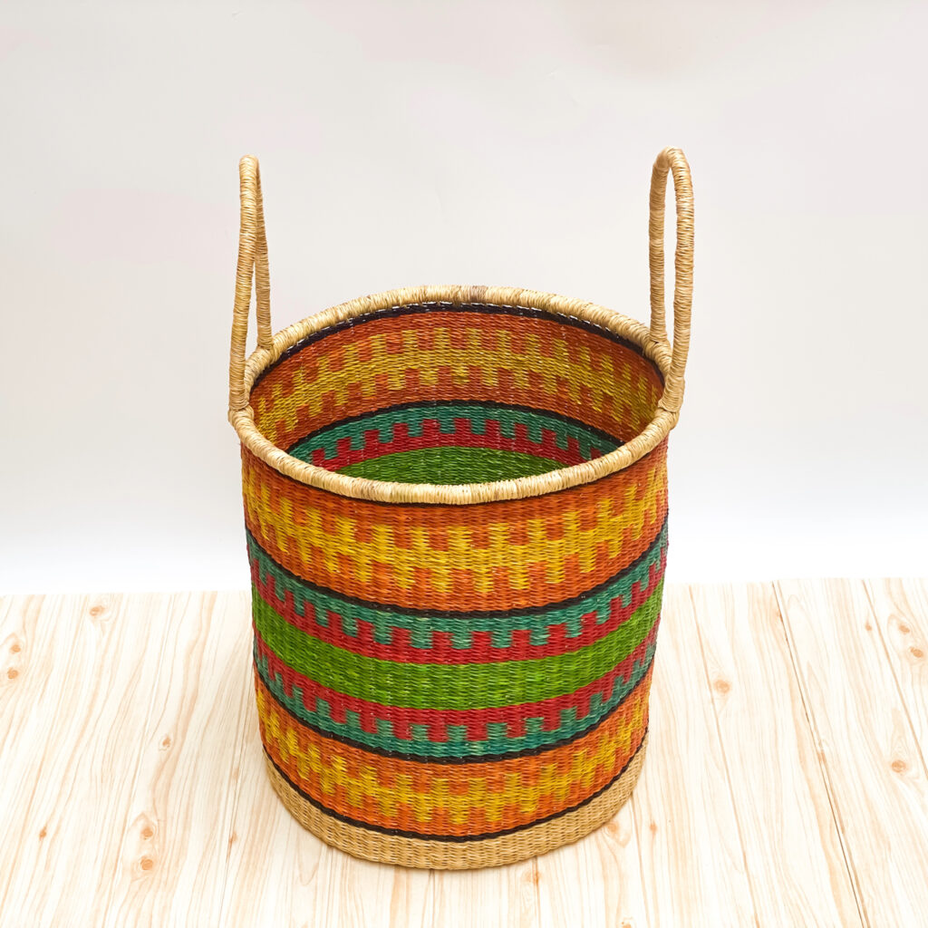 colorful bolga woven laundry basket with handles