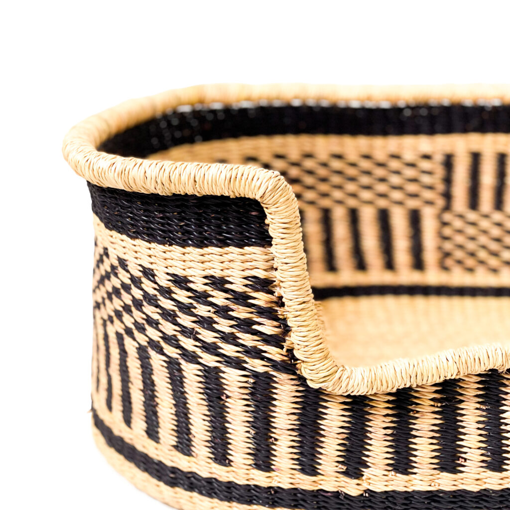 a woven dog bed basket