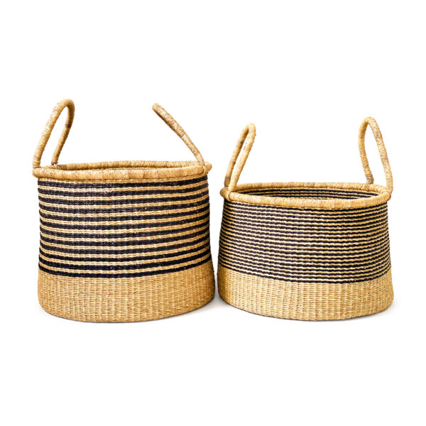 two woven laundry baskets with handles