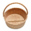 a woven picnic basket with handle on a white background