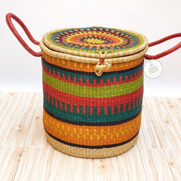 large colorful woven laundry basket with lid