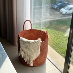 tan woven laundry basket with handles