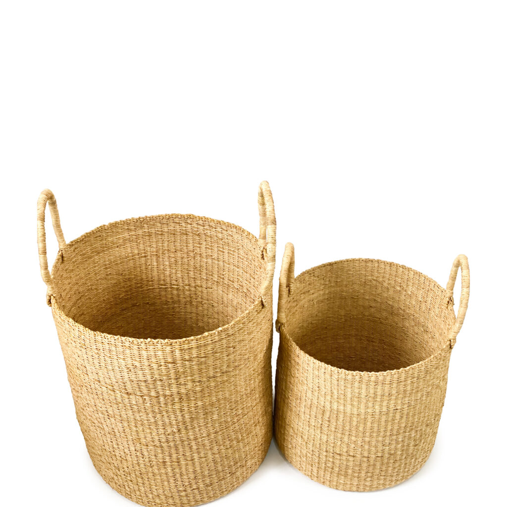 two woven laundry baskets with handles on a white background